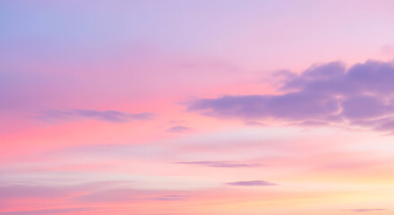 Obraz premium Pastel Sky with Soft Pink, Purple and Yellow Clouds | Dreamy Sunrise Background for Spring, Easter, or Romantic Design