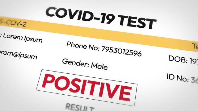 Covid-19 showing positive test result in red color on the report close up, 4k footage. Health, alarming, fever, coronavirus test.