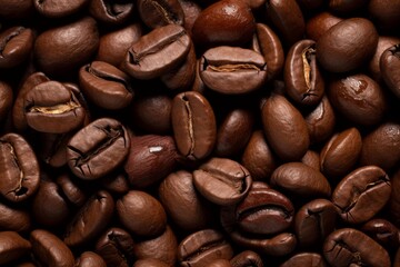 Obraz premium Close up of roasted coffee beans, creating a rich, textured background, ideal for coffee related projects