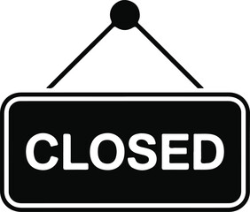 Black and white closed sign hanging on white background