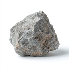 Obraz premium A gray rock on a clean background, ideal for depicting the hardness of earth material 