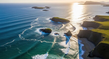 Dramatic coastal cliffs meet the ocean at sunset