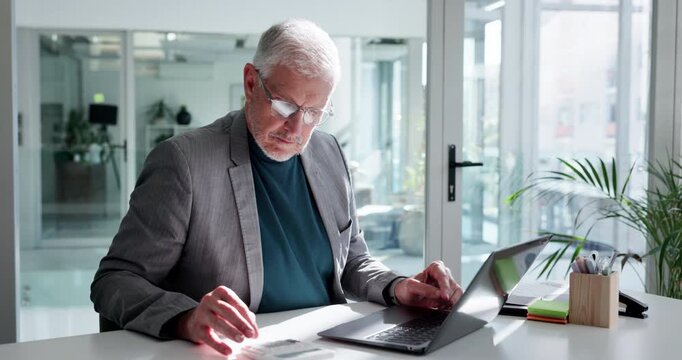 Laptop, business man and calculator in office for financial analysis, internal auditing and payroll. Accountant, mature person and typing on tech for data entry, recording transactions and budgeting