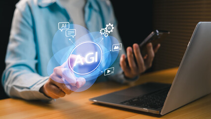 Artificial General Intelligence (AGI) concept. Businesswoman interacting with AGI interface showing AI icons, chatbot, digital data connections for next-generation artificial intelligence technology