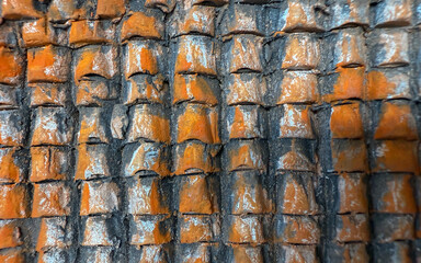 Abstract background with overlapping tile textures in shades of orange and gray