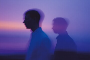 Two silhouetted figures move against a soft purple and pink twilight sky.