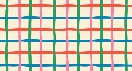 Seamless colorful plaid pattern in hand-drawn geometric style. Trendy checkered vector background perfect for fabric, wrapping paper, textile prints, and cozy holiday designs.