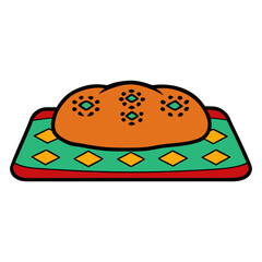 pan de muerto bread on colourful Mexican cloth 