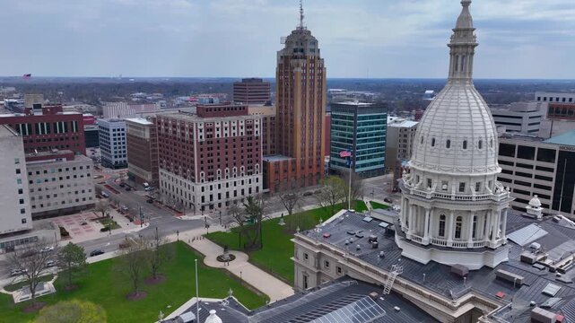 Michigan State Capitol aerial view at the end of Michigan Avenue with Boji Tower, Lansing, Michigan MI, USA. 