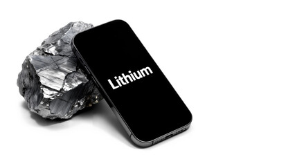 Black smartphone with lithium metal rock. Modern energy concept