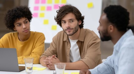 Focused Discussion: A diverse group engages in an intense discussion at a modern office setting. Collaborative efforts and focused expressions are the essence of this image.