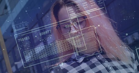 Data analyst analyzing holographic data panels in office space, with checkered shirt and eyeglasses