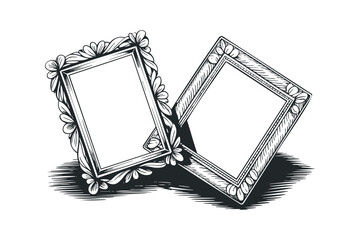 Ornate vintage picture frames with floral ornamentation and shadow
