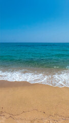 The golden sand of the Beach of Marina di Orosei under the midday sun - Orosei - Nuoro - Sardinia - Italy