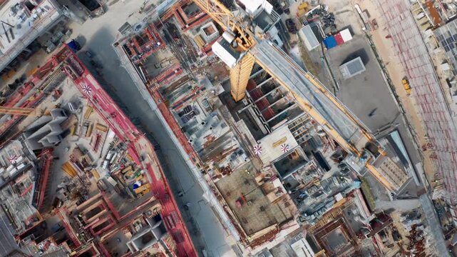 A straight-down aerial shot of a major construction site in Hamburg, Germany, highlighting the scale of building activity, engineering, and urban development within the European Union.