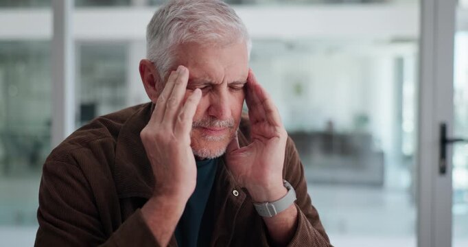 Businessman, headache and laptop in office for financial deadline, auditing crisis and eye pain. Accountant, mature person and tension migraine at desk for payroll mistake and stress or pressure