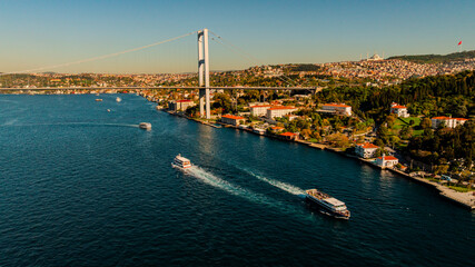 Istanbul Bosphorus Bridge(July 15 Martyrs Bridge). Aerial view of the Bosphorus Bridge with drone on a cloudy day. Unique view of Istanbul. Turkiye.