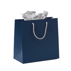 Dark blue gift bag with white rope handles and silver tissue paper on transparent background