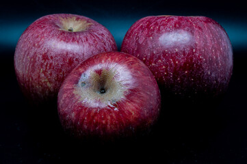 A composition of a typically autumnal fruit, such as the Annurca apples from Campania, which enhances its beauty and details.