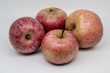 A composition of a typically autumnal fruit, such as the Annurca apples from Campania, which enhances its beauty and details.