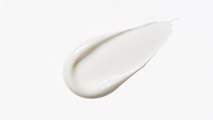 Cream or lotion applied on a white background with a smooth texture. Skincare or cosmetic product. The concept of beauty, skincare, and dermatology.