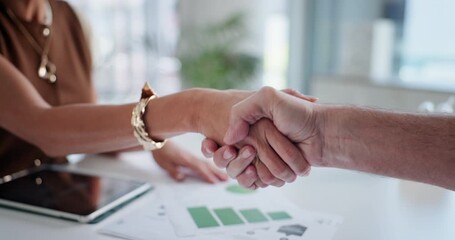 Business people, documents or meeting with handshake for partnership, deal or agreement in office. Closeup, employees or shaking hands with paperwork, graph or tablet for hiring, b2b or collaboration - Powered by Adobe