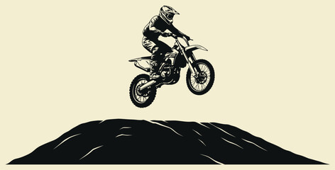 Silhouette of a motocross rider jumping high off a dirt hill against a neutral background © Mst Zakia