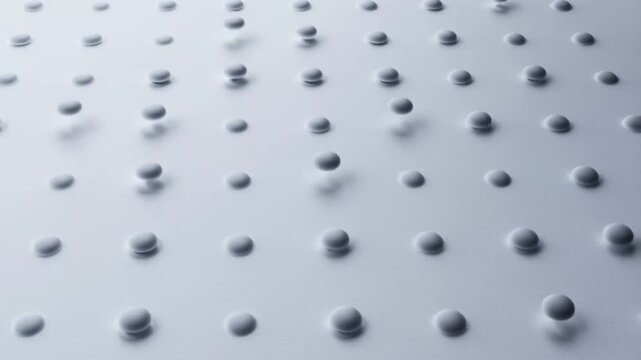 Textured surface with raised dots creating a modern visual pattern for backgrounds and design projects in minimalistic and contemporary settings