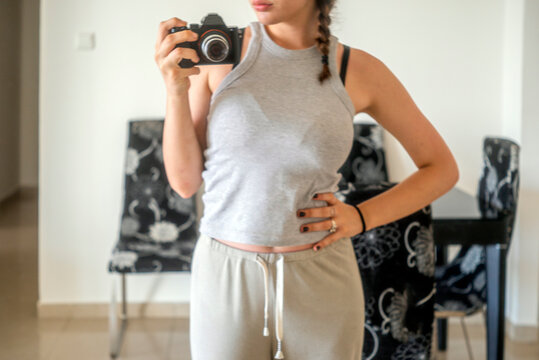 girl posing in front of the mirror