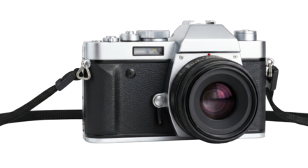 Silver/black camera, lens forward, strap, knobs, against solid dark background