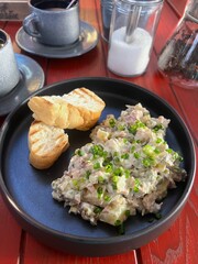 Salad with meat and potatoes on a plate
