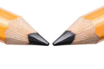 Two sharpened pencils positioned closely together face each other with pointed tips on a clean white background, showcasing their texture and color