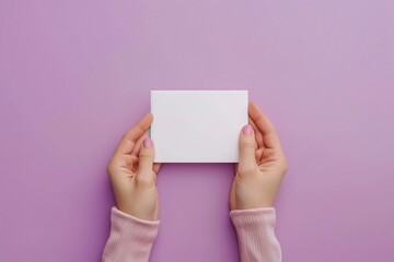 female hand holding blank piece of paper. Concept of emptiness or potential, as blank paper represents blank slate or new beginning