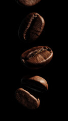 Fototapeta premium Roasted coffee beans falling on black background
