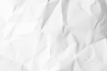 Medium creases of medium bright white crumpled paper used in background illustration.