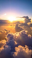 A breathtaking aerial view of a sunset with sunbeams piercing through fluffy clouds