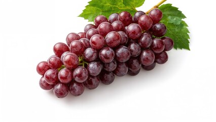 Fototapeta premium Cluster of red grapes with green leaves on a white background.