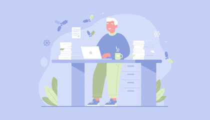 Happy senior worker tackling yearend projects at a desk piled with papers in a winter office