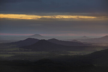 Lusatian mountains in dark autumn with sunrays

