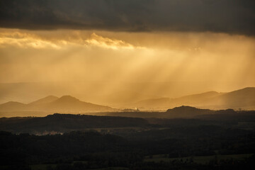 Lusatian mountains in dark autumn with sunrays
