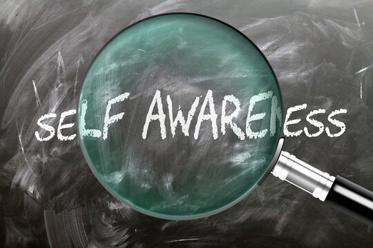 Self Awareness - learn, study and inspect it. Taking a closer look at self awareness. A magnifying glass enlarging word 'self awareness' written on a blackboard ,3d illustration