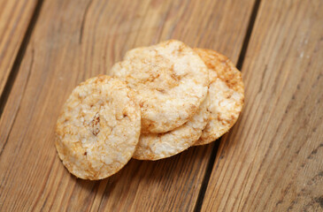 Rice chips crackers on wooden background