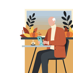 Elderly man checks phone while enjoying coffee break amidst fall leaves and pumpkins