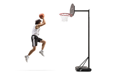 Full length shot of a basketball player perfomring slam dunk © Ljupco Smokovski