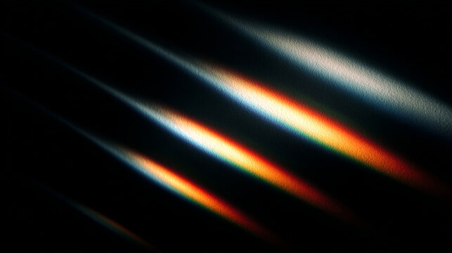 Abstract light refraction creating colorful streaks across a dark textured background