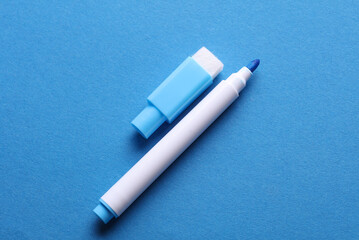Blue marker on a blue background