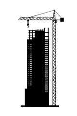 Tall building construction with crane silhouette