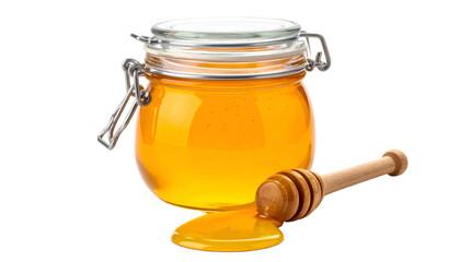A glass jar filled with golden honey and a wooden dipper with a puddle of honey beside it