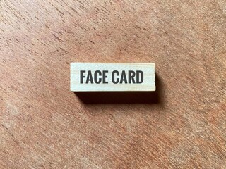 Obraz premium Wooden toy block with Face Card word. Popular slang term used on social media, that serves as a high compliment about a person's attractiveness.