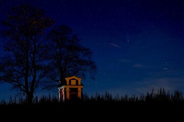 Chapel of St. Florian in Pelhřimov, clear night sky, comet C 2025 A6 (Lemmon) in the right part